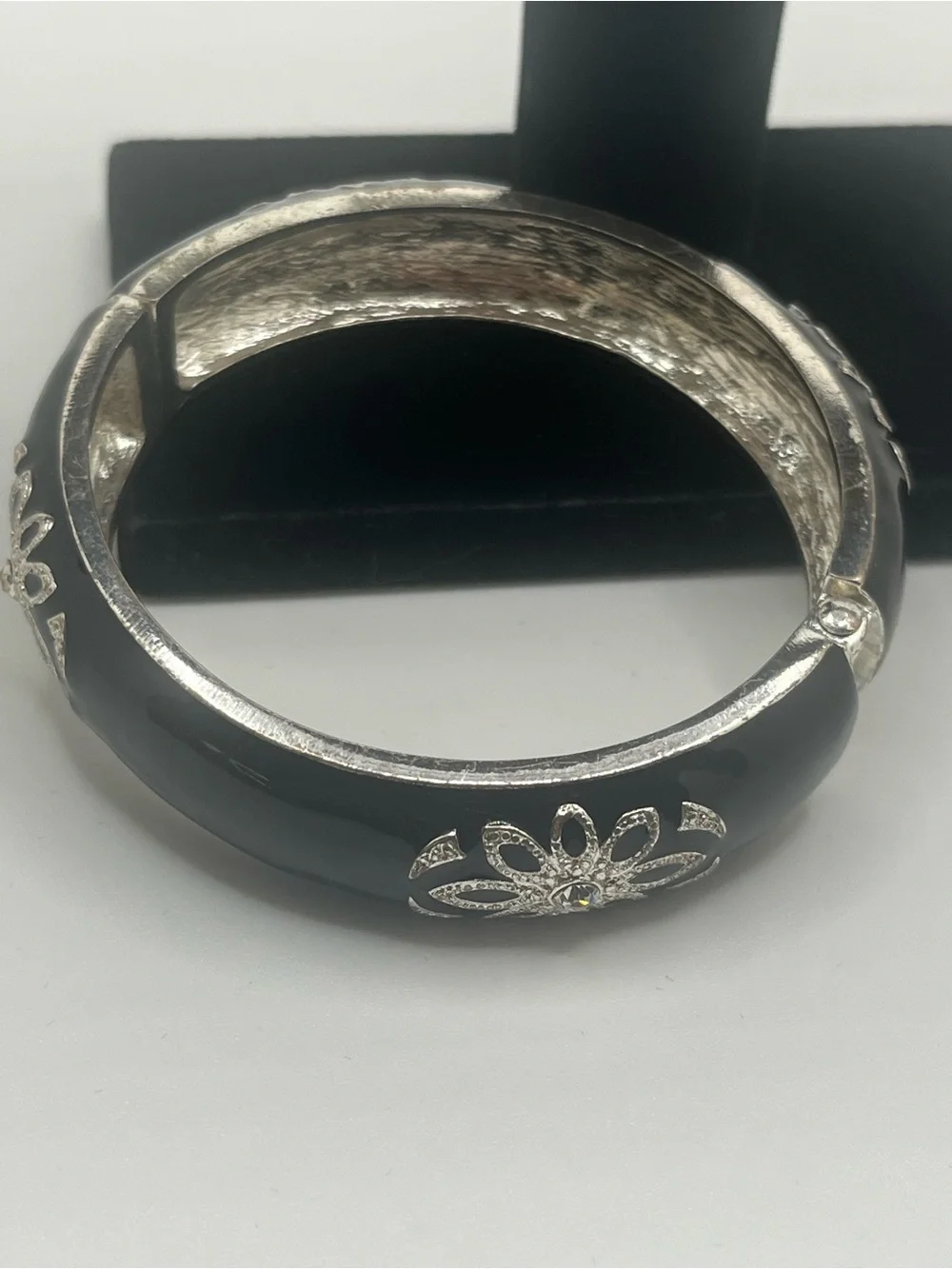 Black enamel hinged bangle bracelet silver tone floral rhinestone accents